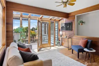 Family room opens to the main hallway, where 2 bedrooms and the main bath are located.