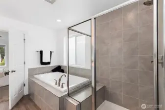 Separate tub and showers in Primary bath.