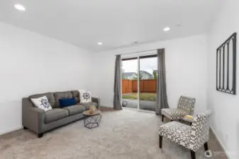 Basement level: living room, bedroom and full bath. Walk out to patio and backyard