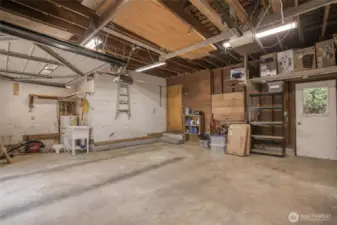 Oversized double garage with utility tub and workshop area