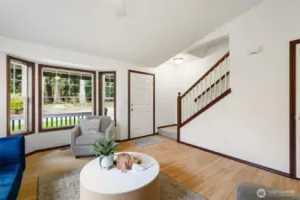 The stairs that lead to the bedrooms is located just off the entry.