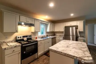 Spacious kitchen with stainless steel appliances