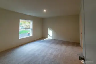 Primary bedroom with lots of natural light