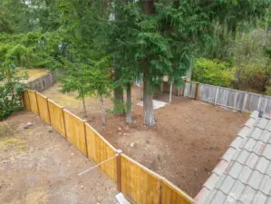 Enjoy a spacious, fully fenced yard surrounded by mature evergreens—offering privacy, shade, and endless potential. Whether you envision a garden, play space, or outdoor entertaining area, this generous lot provides the perfect blank slate to make it your own.