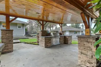Covered outdoor space with BBQ area