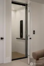 Private in-home elevator connecting all three levels for effortless movement throughout the home.