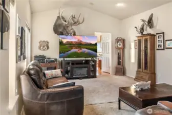 Family room off the kitchen and entry way.