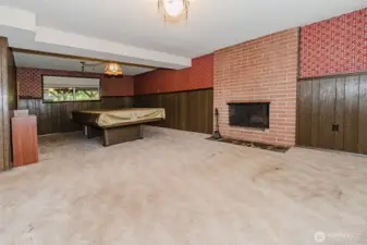 Downstairs with a fireplace