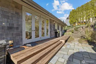 French doors from main living area open to backyard