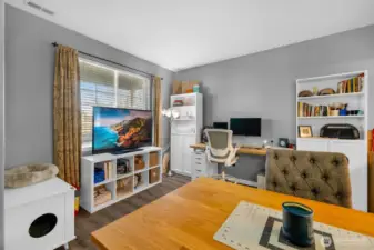 Formal living room is currently used as office