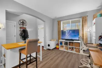 Formal dining room is currently used as craft area