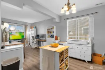 Formal dining room is currently used as craft area