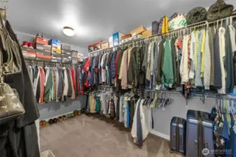 Primary bathroom with huge walk in closet.