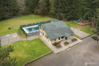 The community clubhouse and pool are one feature of Miller Bay Estates. There is also a community beach and  sport court.