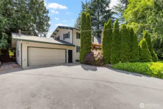 The large two car garage has plenty of storage and room for projects.