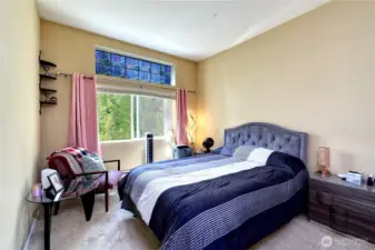 Primary bedroom with tall ceilings