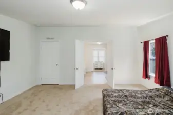 Double doors to the ensuite and walk in closet.