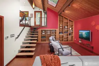 Looking back to the front door, you can see so many built-ins and an enviable media space.