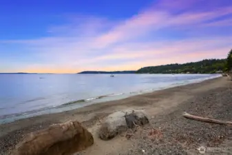 This beach was overhauled completely to have a "natural bulkhead" installed (at great expense). This is better for the environment and works beautifully. It is also lovely to behold.