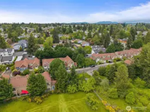 End unit, surrounded by privacy in an exclusive gated community!