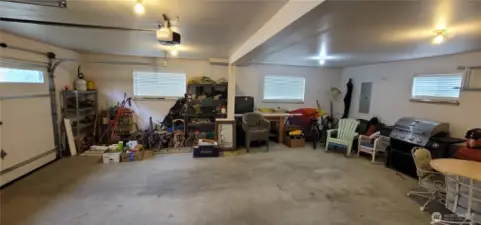 Large garage with entrance to home