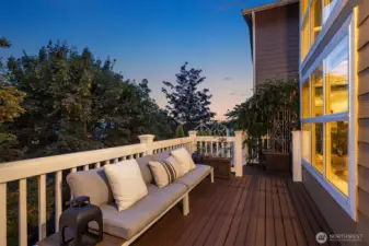 The owners extended the main floor deck to span the length of the home and added stairs down to the back yard.