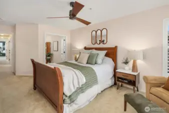 This amply-sized primary bedroom includes a spacious walk-in closet (not pictured).