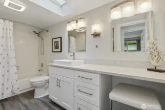 Bathroom with skylight, extended vanity and additional additional storage
