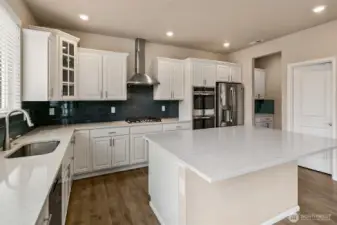Kitchen has a large walk-in pantry and plenty of cabinet space.