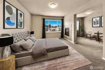 Large Primary Bedroom with gas fireplace. This photo has been virtually staged.