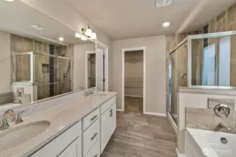 Primary bathroom with double sinks, shower and tub separate