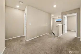 Loft area on the second floor near the bedrooms.