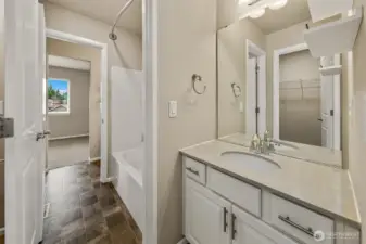 Jack-n-Jill bathroom that is accessed off 2 bedrooms on the upper level.