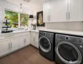 Spacious laundry room and sink