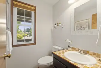 Handy half bath on the main level.