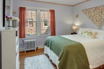 ~bedroom with hardwood flooring