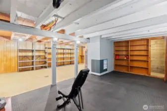 Built-in bookcase and "hidden" storage room seen on the right...