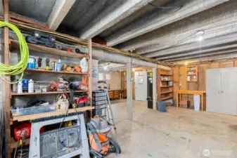 This wall/opening is opposite the laundry machines, which are to the right of the photo.