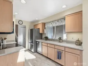 Kitchen features brand new appliances, abundant cabinet space & the large windows provide lots of naturall light