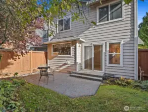 Looking back at the condo, backyard & patio