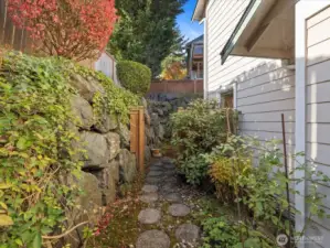 Welcome to the beautifully fenced & landscaped back yard