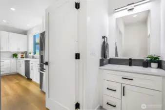 Half bathroom off of kitchen.