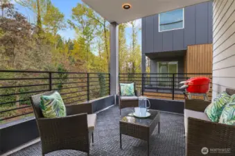 Private deck with lush greenbelt views.