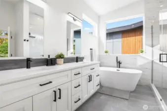 Attached spa-like primary full bath.