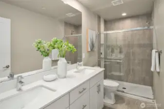 Stylish yet classic primary bathroom.