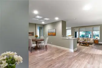 This view shows the division between formal dining and living room.