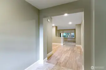 Entry has a wide open space with room for a bench or side table.  Closet is to the right.