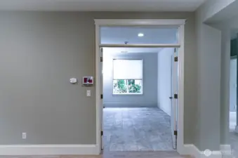 Private den.  Tiled flooring is perfect for craft room.