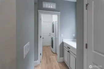 Utility room is a straight walk off the kitchen.  Door ahead leads to the garage.  Perfect for bringing in shopping.