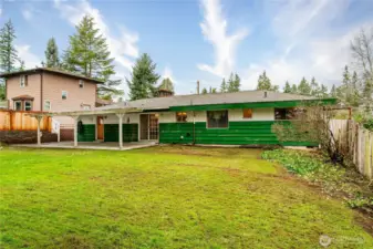 Large, fenced backyard.
